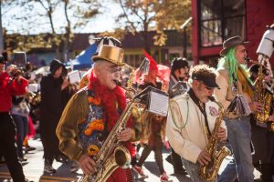 saxophone players march with their band