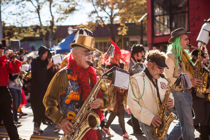 saxophone players march with their band