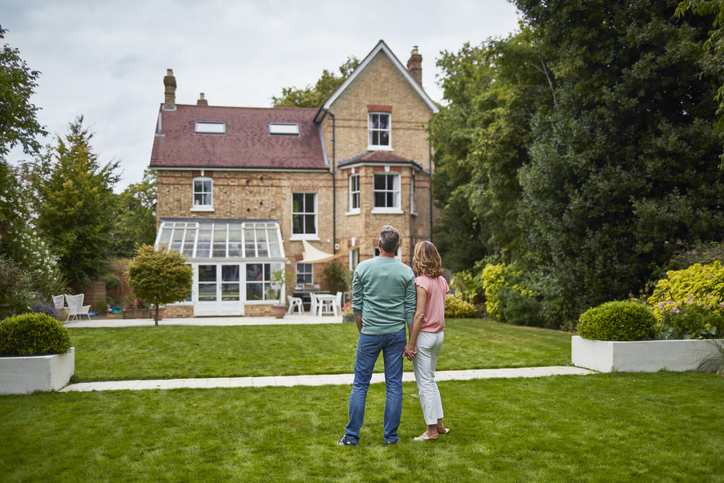 Couple looking at house